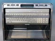 A vintage ACT Apricot portable computer