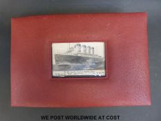 An album of postcards to include Titanic, WWII, UK topographical, further shipping including Cunard,