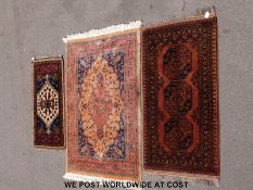 Three various small rugs including a small prayer mat