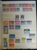 A stockbook of GB stamps, George VI to QEII, together with a Silver Jubilee album,