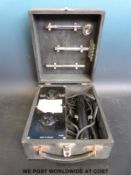 A Buchbinder electro therapy machine in portable carry case, model HF99 with glass attachments.