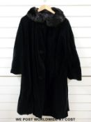 Various black velvet clothing including mourning