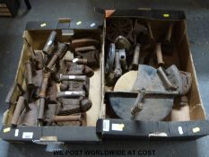 A collection of irons, trivets,