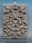 A wooden carved plaque dipicting oak leaves and acorns (approximately 36x25cm)