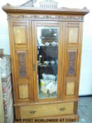 A carved satin walnut wardrobe (H212 x W117 x D40cm)