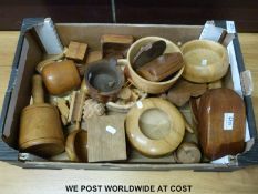A box of wooden items including bowls,