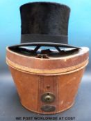 A top hat by Christys' London marked Rolfe & Morgan, 20 Southgate Street, Gloucester,