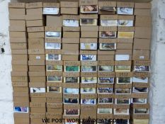 Approximately 104,000 postcards, contained in 104 boxes,