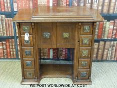 A mahogany desk converted from a sewing machine table with five drawers to either side (H73 x W75 x