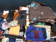 A collection of ladies vintage gloves and scarves