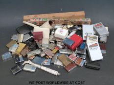 A large collection of cigarette lighters and other smoking related items, pipes, vesta,