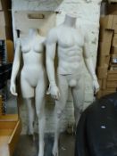 A pair (male and female) of Quicksilver mannequins
