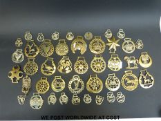 Approximately 25 late 19thC / early 20thC and later mainly cast horse brasses including King's