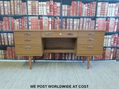 A retro Schreiber sideboard with seven drawers (H73 x W152 x D42cm)