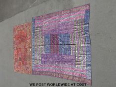 A likely Middle Eastern or Indian hand made wall hanging with mirrored panels together with a