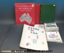 A box of mainly GB and Australia stamps in albums,
