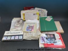 A box of sundry albums, album sheets and loose stamps,