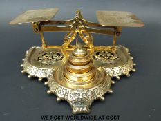 A Townsend & Co brass letter scale with cast base and weights to front marked to underside with
