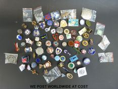 A collection of enamel badges including examples from the Freud museum, London,