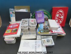 A substantial quantity of loose stamps in tins,