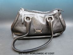 A coccinelle handbag in black leather