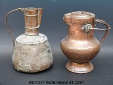 Two North African copper jugs