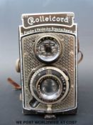 A Rolleicord TLR camera in leather case