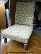 A mahogany dressing table mirror and a nursing chair