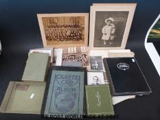 A collection of postcards and photographs in albums and loose, Edwardian, humorous, naval,