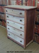 An elm and pine chest of five drawers,