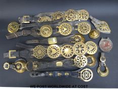 A quantity of martingales and other horse harness with brasses to include snowflake, heart,