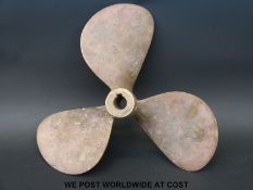 A bronze 15 x 15 inch boat propeller
