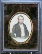 A framed portrait miniature of a gentleman (maximum diameter 14cm),