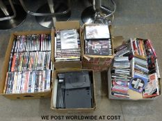 A large collection of DVDs and CDS