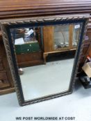 An ornate wall mirror (H88 x W62cm)