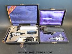 Two cased auroscopes / opthalmoscopes c1940s, one by Theodore Hamblin, London, the other by Keeler,