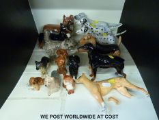 A collection of largely Beswick dogs including Dalmatian,
