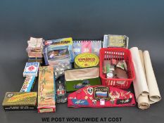 A collection of playing cards, motoring collectables,