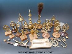 A quantity of horse brass type bells including swinging king's crown etc.