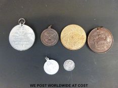 A group of medal medallions to commemorate George V and Queen Mary