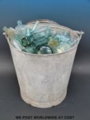 A large collection of vintage chemist and similar type glass bottles etc