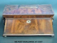 A 19thC flame mahogany rosewood sarcophagus tea caddy
