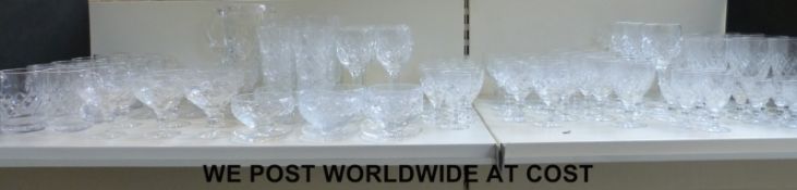 A suite of glasses all with cut decoration, comprising 12 water glasses, 12 large wine glasses,