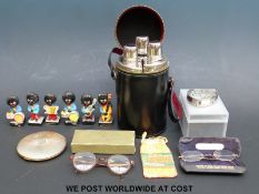 A quantity of collectables to include DKNY watch, compact, glasses, golly figures,