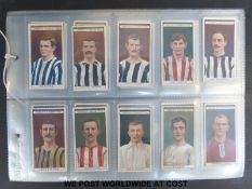 A set of Ogden's Famous Footballers cigarette cards