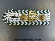 A WWII German 'shoulder board' with two pips and RSV brass badge for the Reichsfinanzverwaltüng or