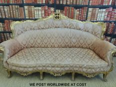 A 19thC gilt wood salon suite.