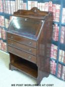 A small bureau with plaque 