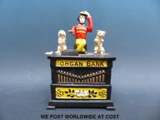 Kyser & Rex cast iron 'Organ Bank' money box with a monkey, cat and dog on top of a barrel organ,