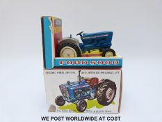 Britains Ltd diecast model Ford Super Major 5000 Diesel Tractor with blue body and white plastic
